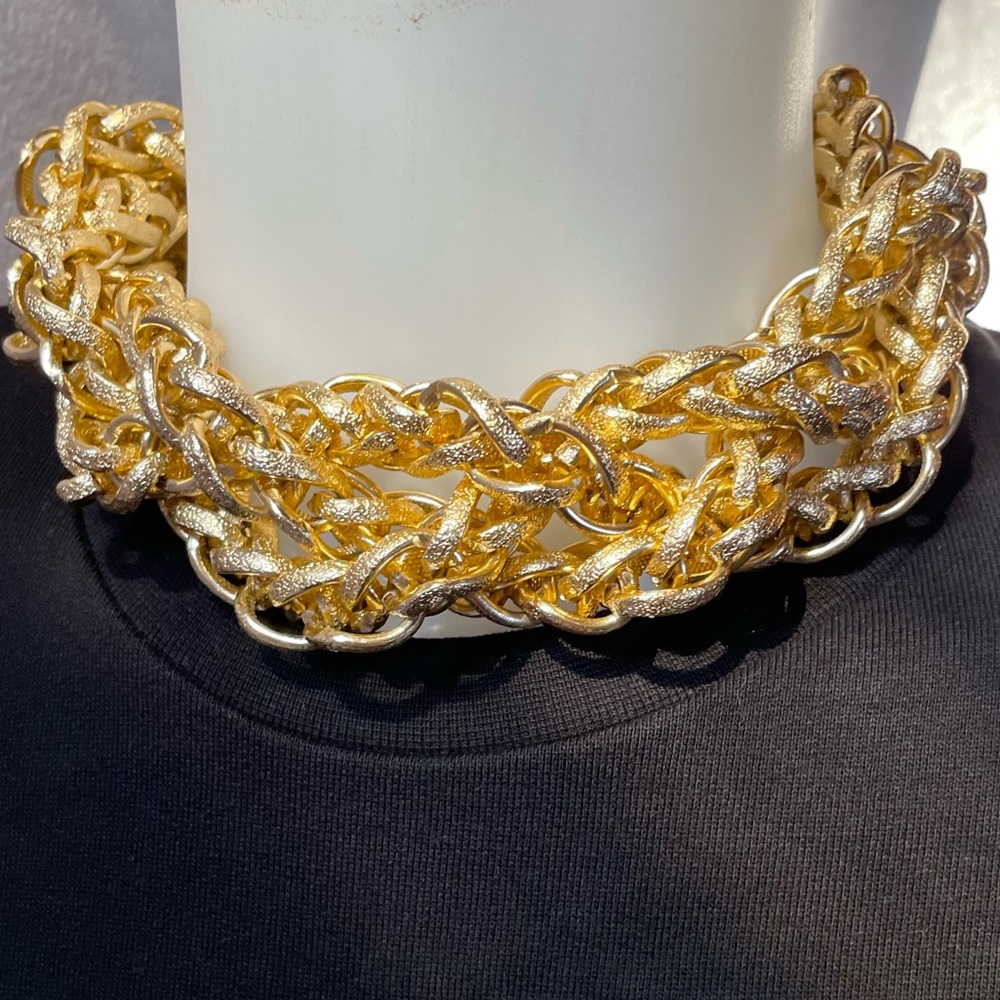 Gold chain choker necklace.